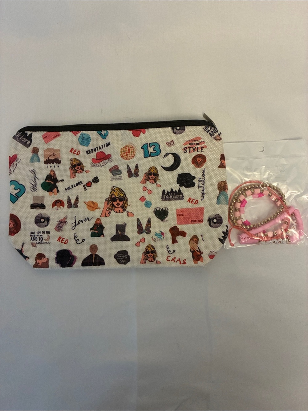 White Graphic Taylor Swift Accessory Pouch with Friendship Bracelet Set